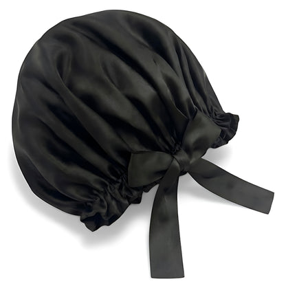 Black silk bonnet on a white background